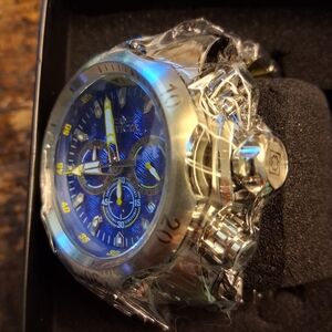 Invicta Men's Silver Case Watch with Blue Dial and Yellow Accents